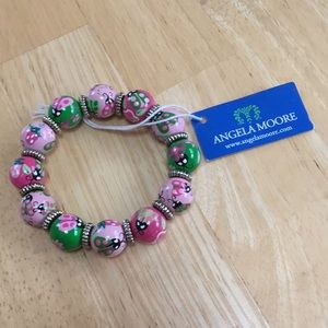 Angela Moore pink and green beaded bracelet